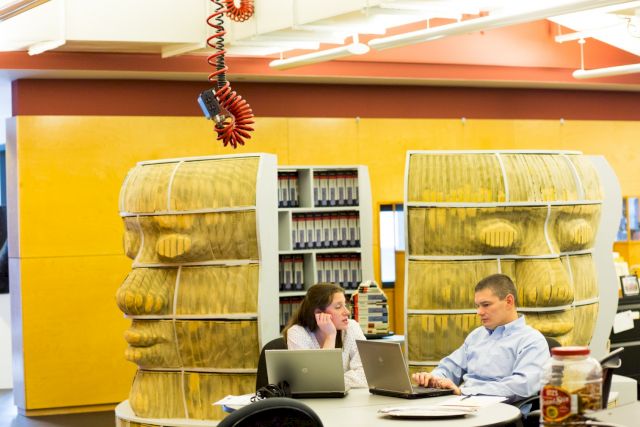 Long Bin Chen, Meeting Room, 2003, 1,000 carved New York City telephone books, wood shelving. Courtesy The West Collection at SEI, Oaks, PA