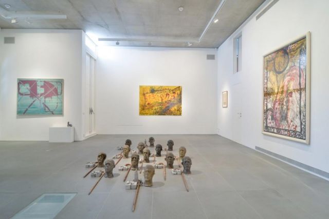 (floor) Erez Israeli; (left) Moshe Kupferman; (right and middle) Moshe Gershuni (Installation view of "Sorting Out" at the Givon Art Forum, Tel Aviv)