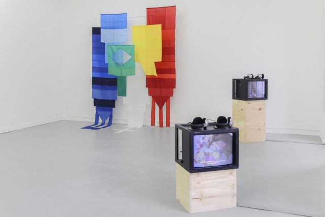 (l–r) ANDREA CANEPA, Untitled (Flags), 2014; RONA YEFMAN & TANJA SCHLANDER, Pippi longstocking at Abu Dis, 2008; BOUCHRA KHALILI, Mapping Journey #5, 2010 (installation view). Photo: © Pascal Vanneau