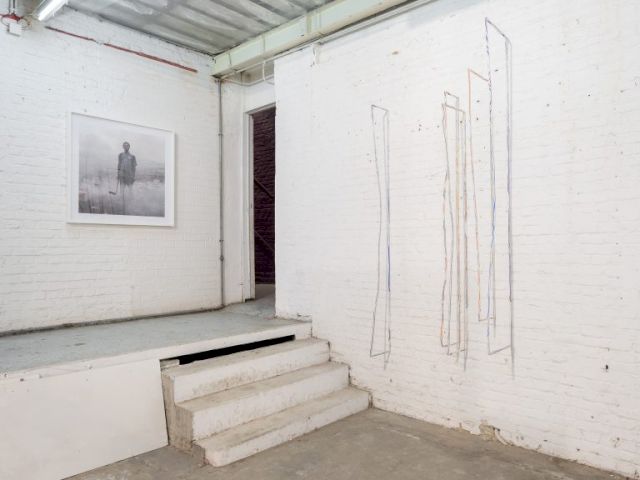 (l–r) PIETER HUGO, Permanent Error - Aissah Salifu, Agbogbloshie Market, Accra, Ghana, 2010; ALICE CHANNER, Eyes (part I), 2012. © Hugard & Vanoverschelde