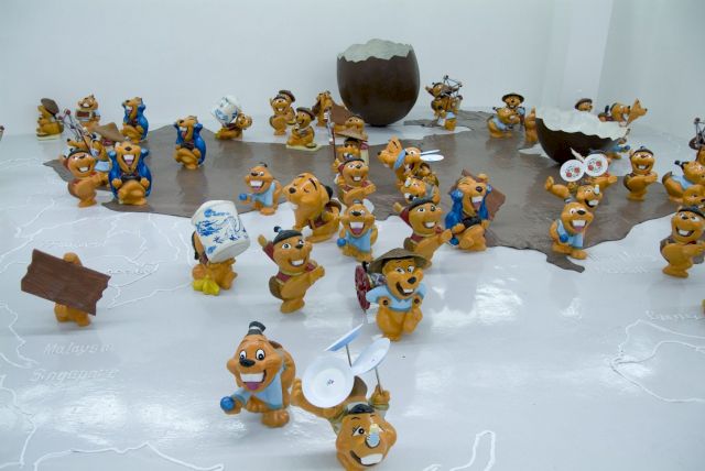 Shen Yuan, The Dinosaur's Egg: A Kinder surprise, installation, 61 fiberglass figures, 2001