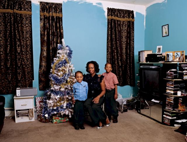 Deana Lawson, Coulson Family, 2008, from As We Rise: Photography from the Black Atlantic (Aperture, 2021). © Deana Lawson, courtesy Sikkema Jenkins & Co., New York