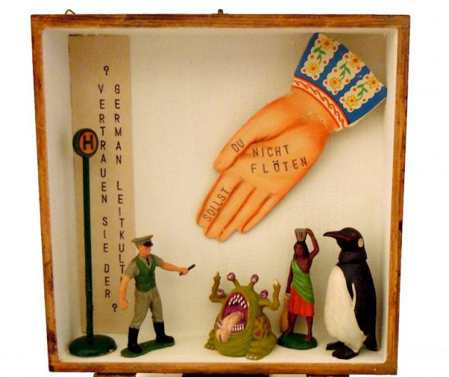 PRINZ, Merz: 3 Migranten Vor Deutscher Bürokratie, 2000. Courtesy the artist & WTC, Hamburg. Photo: Andrea Zimmermann