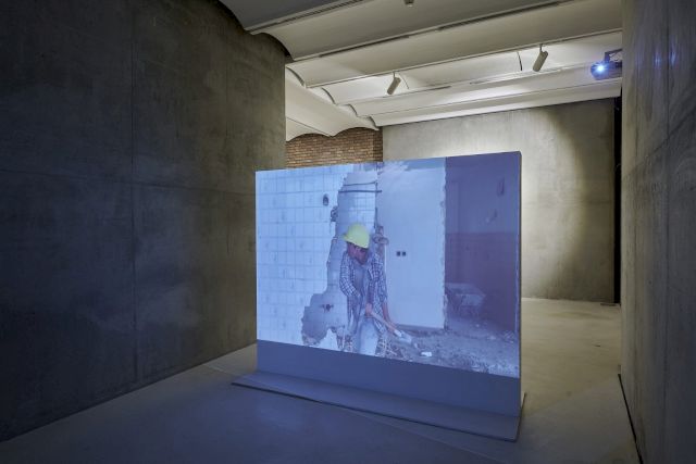 NAZGOL ANSARINIA, Fragment 2 (from the series Demolishing Buildings, Buying Waste), 2017, film still. Photo: Hamid Eskandari & Shima Mirsaeidi